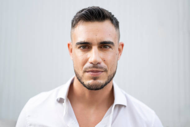 istock Headshot portrait  of confident Hispanic man 2192815569