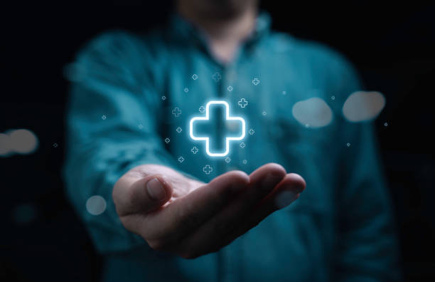 istock Businessman holding white plus sign  for positive thinking mindset of personal development benefit and health insurance concept. 2192815846