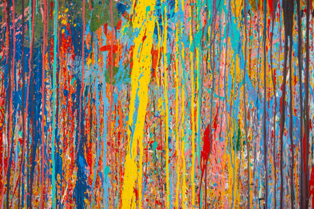 istock Dynamic abstract art features bold paint splatters and drip painting, creating a textured, vibrant color composition for artistic expression, modern art, and creative splash in designs and posters. 2192817315