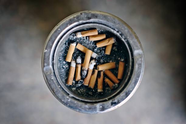 istock Directly Above Shot Of Cigarette Butts In Ashtray. Horizontal image with selective focus. 2192818261