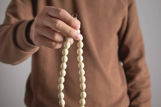 istock Caucasian man holding a rosary beads. 2192822083