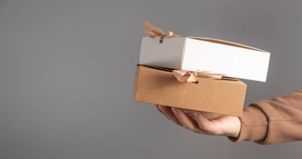 istock Caucasian man showing a gift box. 2192822099
