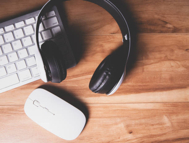 istock modern laptop with wireless mouse, headphones and keyboard, top view 2192822999