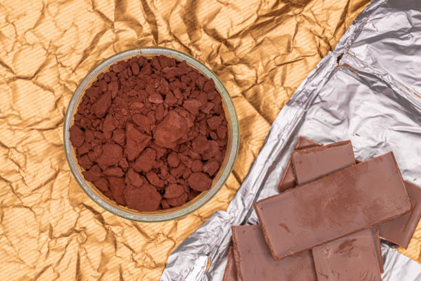 istock Cocoa powder in glass tray with some milk chocolate 2192824878