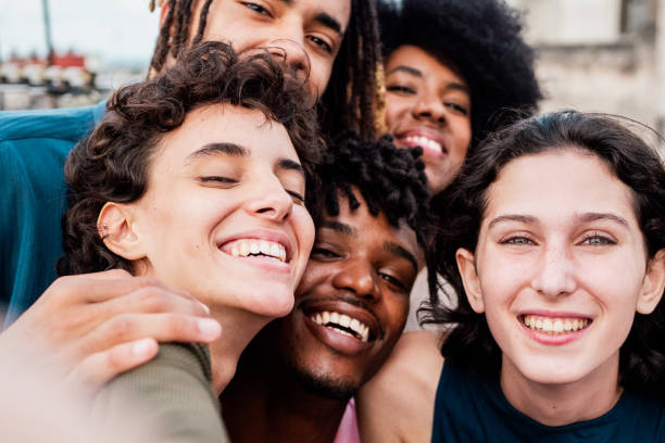 istock Young friends taking a selfie on rooftop - Camera point of view 2192824921