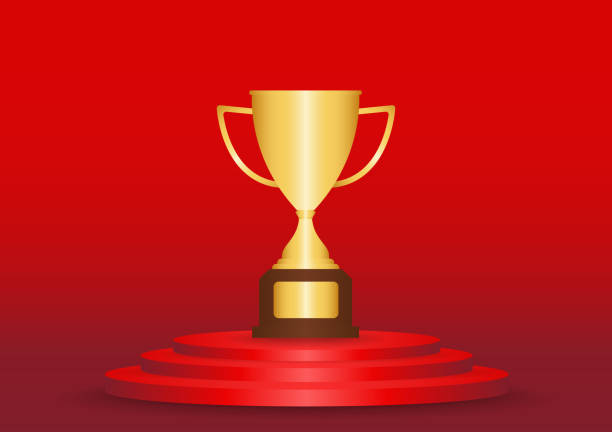 istock Golden Trophy Cup. Winner Cup Award on Stage Podium. Winner Podium. Champion and Winning or Celebration Concept. 2192832148