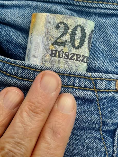 istock 20000 forint banknote in jeans pocket with hand. 2192835934