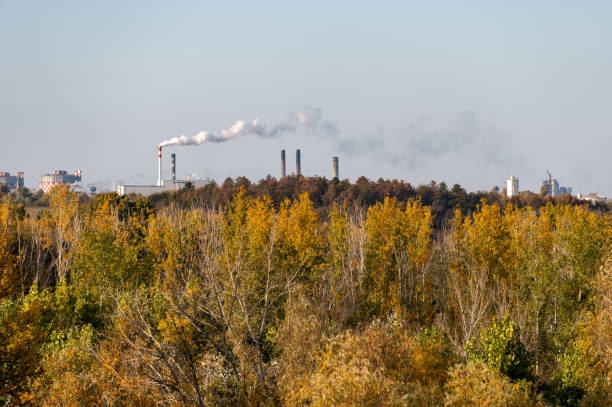 istock Industrial skyline above autumn trees 2192836008