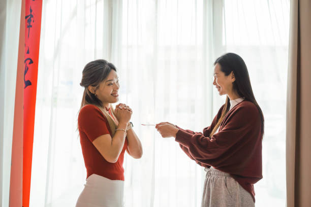istock Happy friends celebrating chinese new year 2192838124