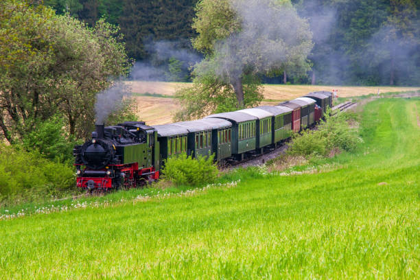 istock train with smoking steam locomotive 2192839877