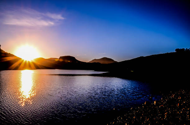 Bosque del Apache Wildlife Refuge: Sunrise Over Pond/Lake