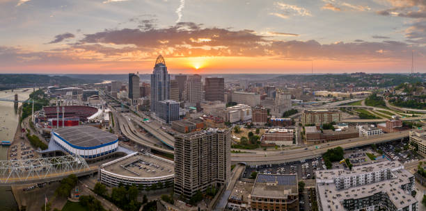 istock Cincinnati, Ohio transportation infrastructure. View from above of American big freeway intersection at sunset with fast moving cars 2192844537