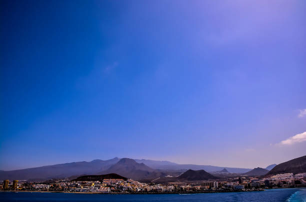 istock A beautiful blue sky with mountains in the background 2192844721