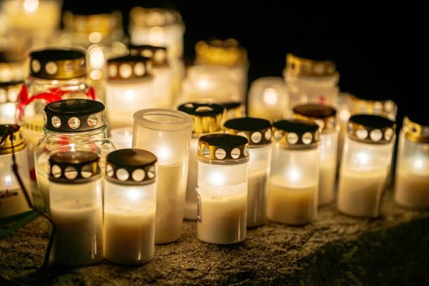 istock Grave candles in a cemetery at all saints eve. 2192844994