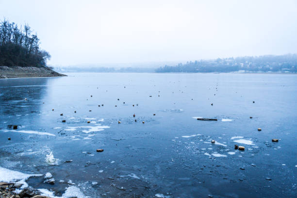 Ice and snow on frozen lake, Sweden.