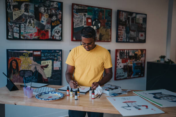 istock Male artist working in studio 2192855178
