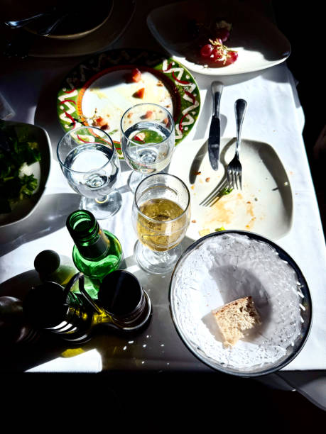 Leftover food after meal at italian restaurant. Food waste is a huge and growing environmental, financial, and social problem globally.
