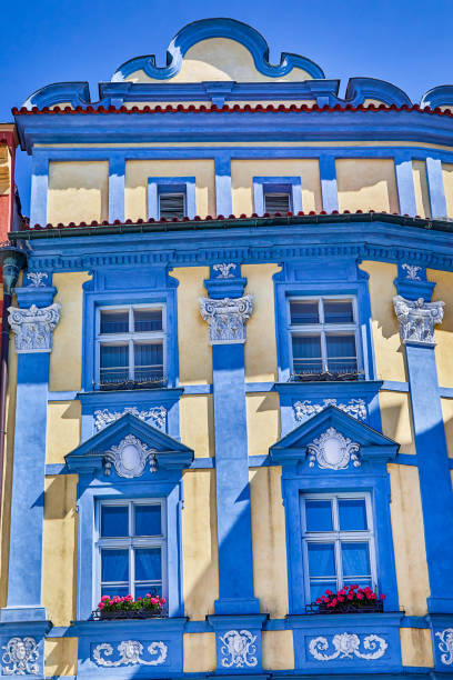 Window facade with many different design and architectural features on building exteriors in the city of Prague, Europe, Czech Republic