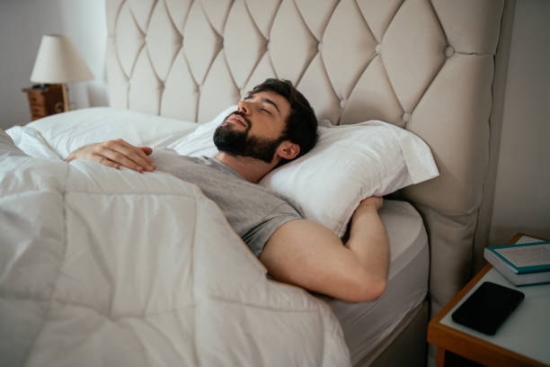 istock Hispanic Brazilian bearded man sleeping on the bed 2192871753