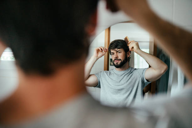 istock Mirror view of bearded man in the bathroom 2192871766