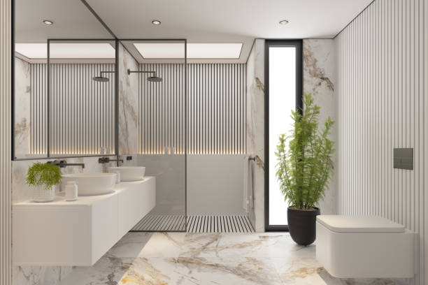 istock Modern Minimalist White Master Bathroom Interior with Double Sinks and Shower with large marble tiles and plants 2192874520