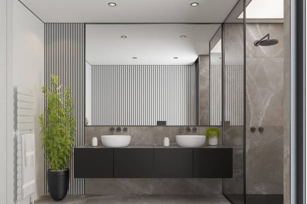 istock Modern Minimalist Master Bathroom Interior with Double Sinks and Shower with large marble tiles and plants. Black furniture cabinets. 2192874600