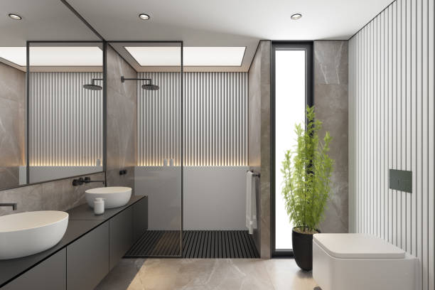 istock Modern Minimalist Master Bathroom Interior with Double Sinks and Shower with large marble tiles and plants. Black furniture cabinets. 2192874602