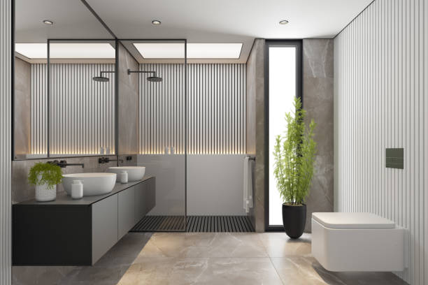 istock Modern Minimalist Master Bathroom Interior with Double Sinks and Shower with large marble tiles and plants. Black furniture cabinets. 2192874684