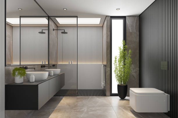 istock Modern Minimalist Master Bathroom Interior with Double Sinks and Shower with large marble tiles and plants. Black furniture cabinets. 2192874685