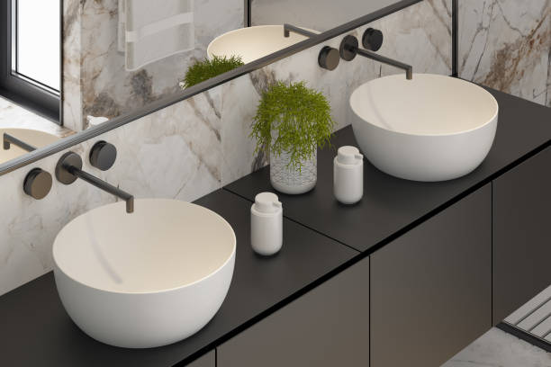 istock Modern Minimalist Master Bathroom Interior with Double Sinks and Shower with large marble tiles and plants. Black furniture cabinets. 2192874686