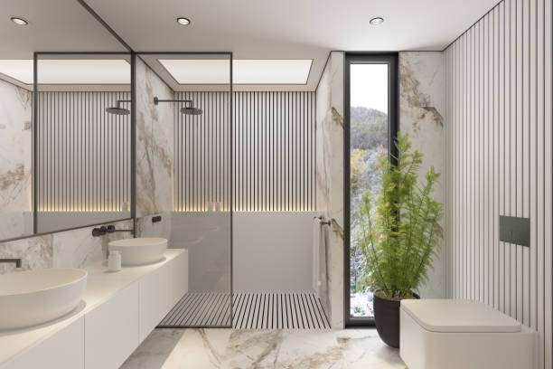 istock Modern Minimalist White Master Bathroom Interior with Double Sinks and Shower with large marble tiles and plants 2192874778