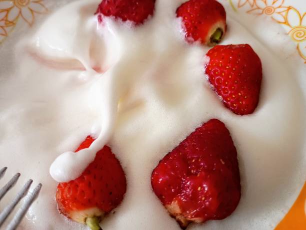 istock Strawberry with whipped cream 2192877382