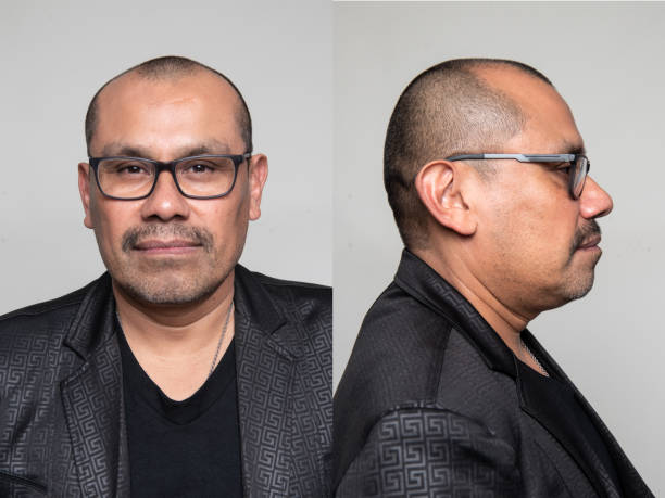 Smiling hispanic mature man front and profile mugshots