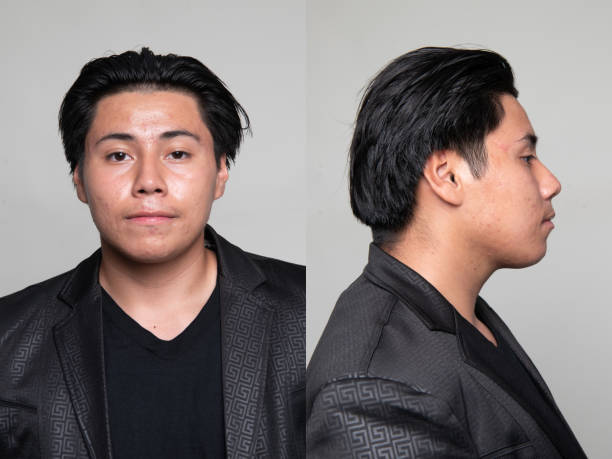 istock Smiling hispanic young man front and profile mugshots 2192878693