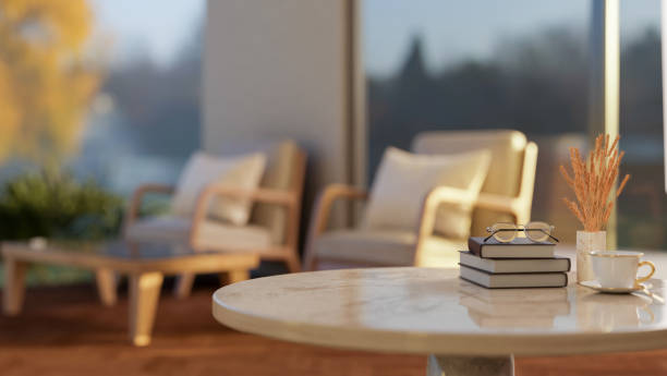 istock A round marble table featuring space for product display, with a blurred background of a living room 2192890308