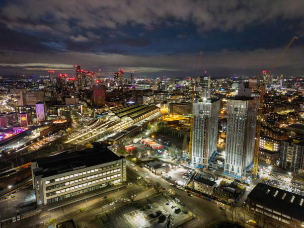 istock Mancheter cityscape at dusk with skyline features 2192893579