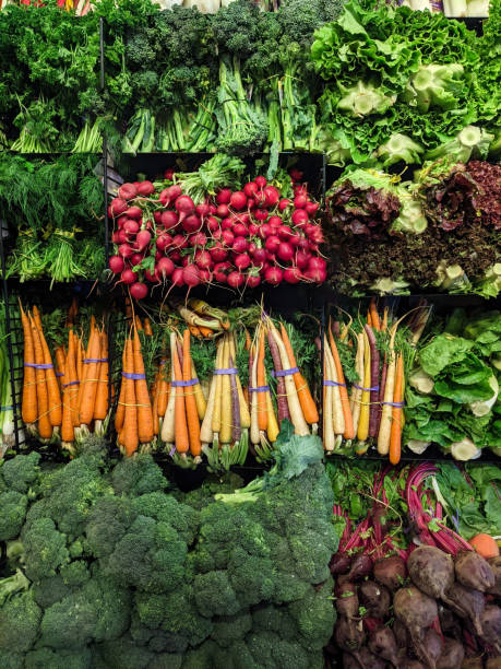 istock Fresh vegetables on a vibrant grocery display 2192893636