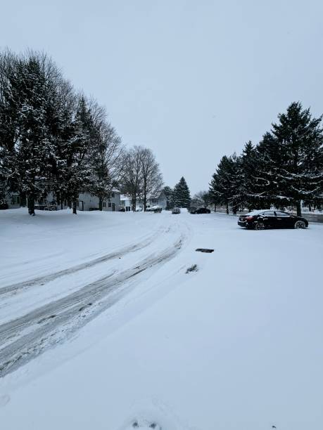 istock Morning scene in parking lot after a snowfall 2192895111