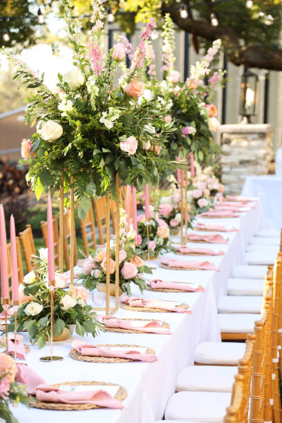 istock Elegant Garden Wedding Table with Lush Florals and Candlelight 2192895235
