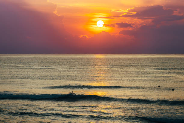 Sunset landscape with big surf waves.Bali Island, Indonesia.