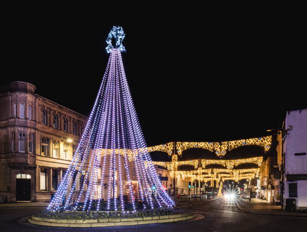 istock Festive town square with illuminated Christmas tree. 2192903567