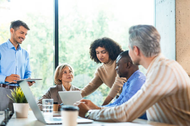 istock Business team discussing together business plans in office. 2192911564