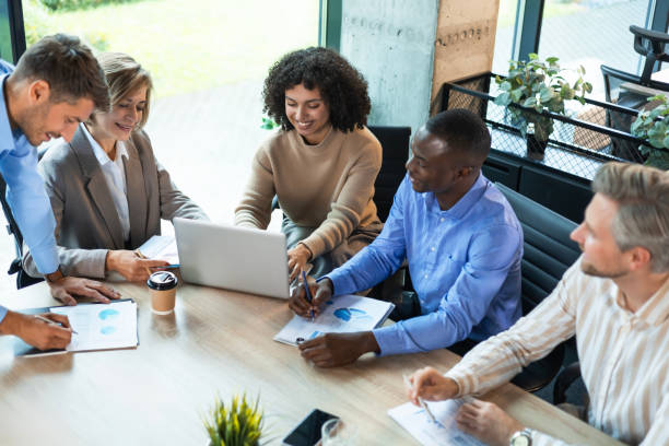 istock Business team discussing together business plans in office. 2192911579