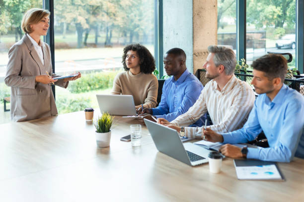 istock Business meeting - manager discussing work with her colleagues. 2192911635