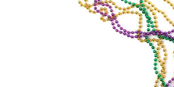 Mardi gras beads on white background Mardi Gras beads isolated on white background mardi gras flyer stock pictures, royalty-free photos & images