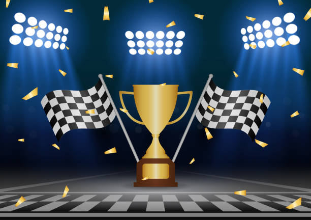 istock Golden Trophy Cup or Racing Champion Cup  with Checkered Flag in Racing Track. Champion and Winning or Celebration Concept. 2192921341