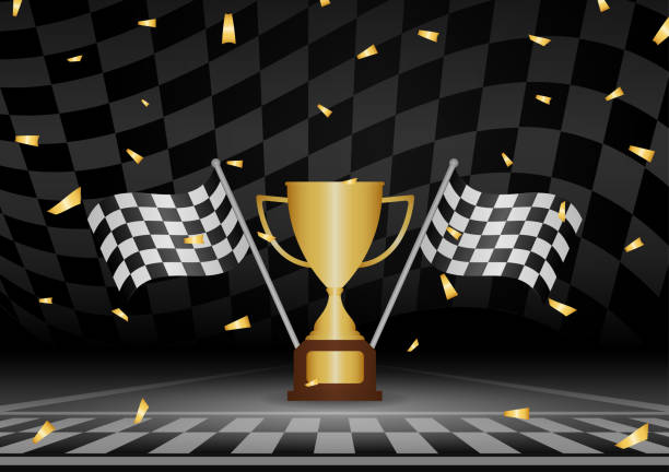 istock Golden Trophy Cup or Racing Champion Cup  with Checkered Flag in Racing Track. Champion and Winning or Celebration Concept. 2192921371