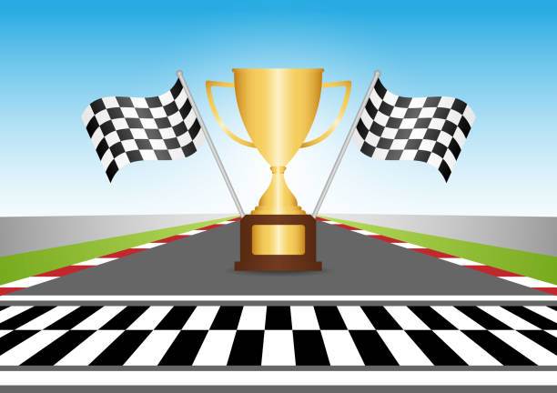 istock Golden Trophy Cup or Racing Champion Cup  with Checkered Flag in Racing Track. Champion and Winning or Celebration Concept. 2192922470