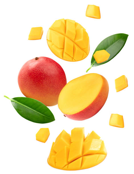 istock flying mango with slices and green leaves isolated on white background. clipping path 2192923502