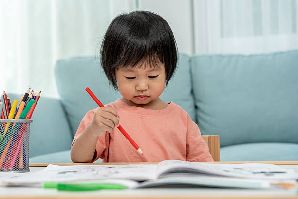 istock Happy Asia children playing learning paint on paper. Activity, development, IQ, EQ, meditation, brain, muscles, essential skills, family having fun spending time together. Holiday 2192924910